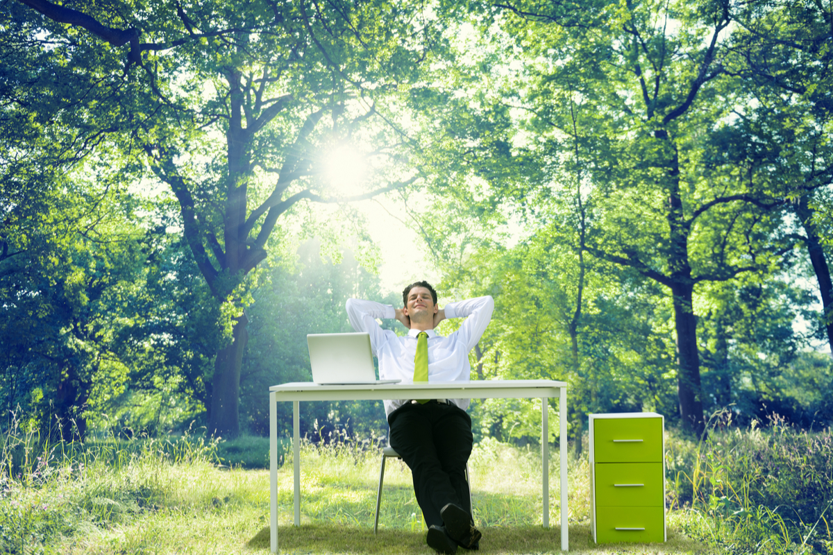 green business man in nature